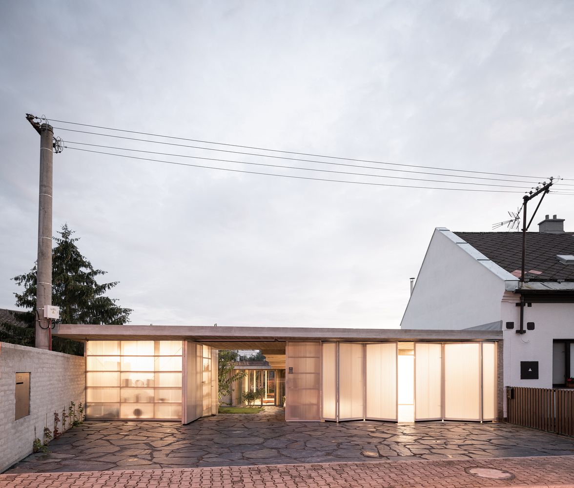 Atrium house merging with the landscape