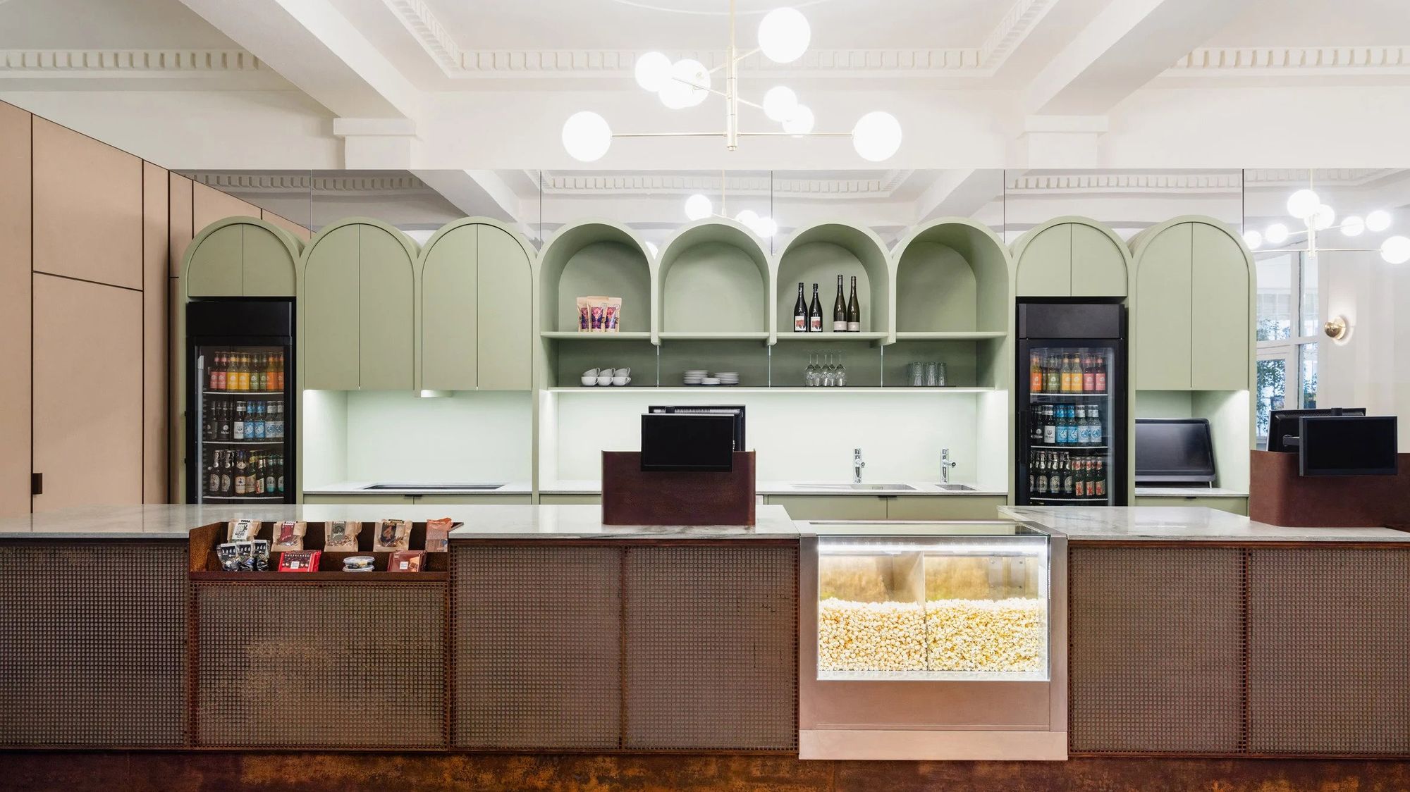 One of Berlin’s oldest cinemas is reborn in pastel and earth-colored hues