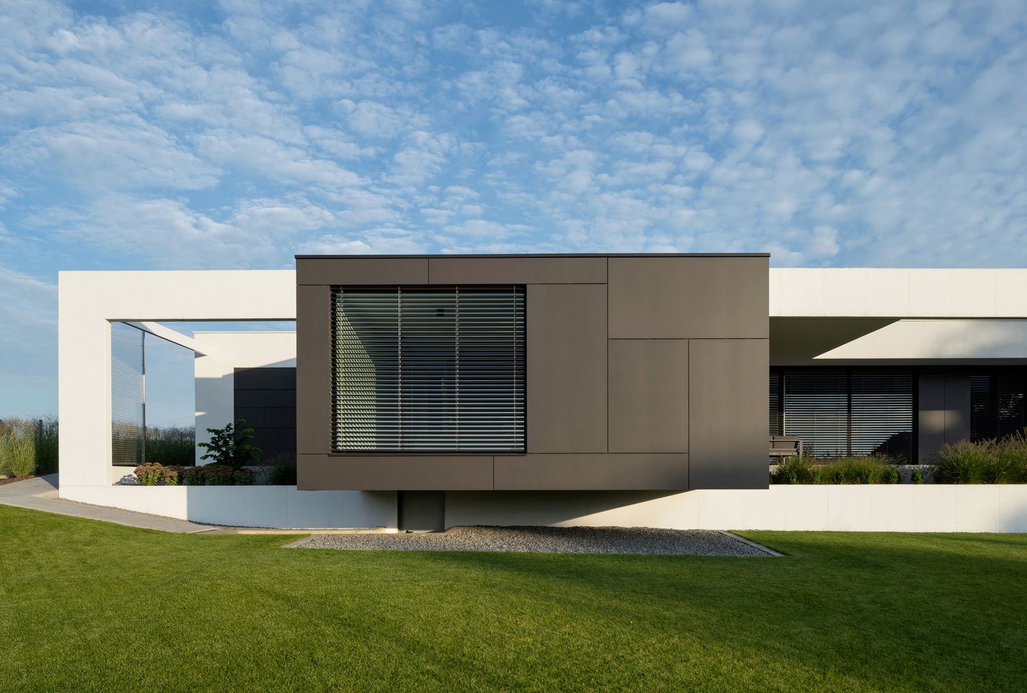 Floating cube serves as a bedroom in this modern house