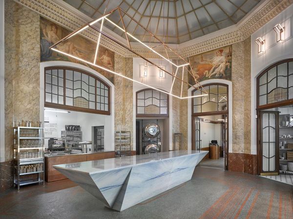 Everyday food in a luxurious setting—this is what a steak kitchen and butcher shop looks like, transformed from a bank